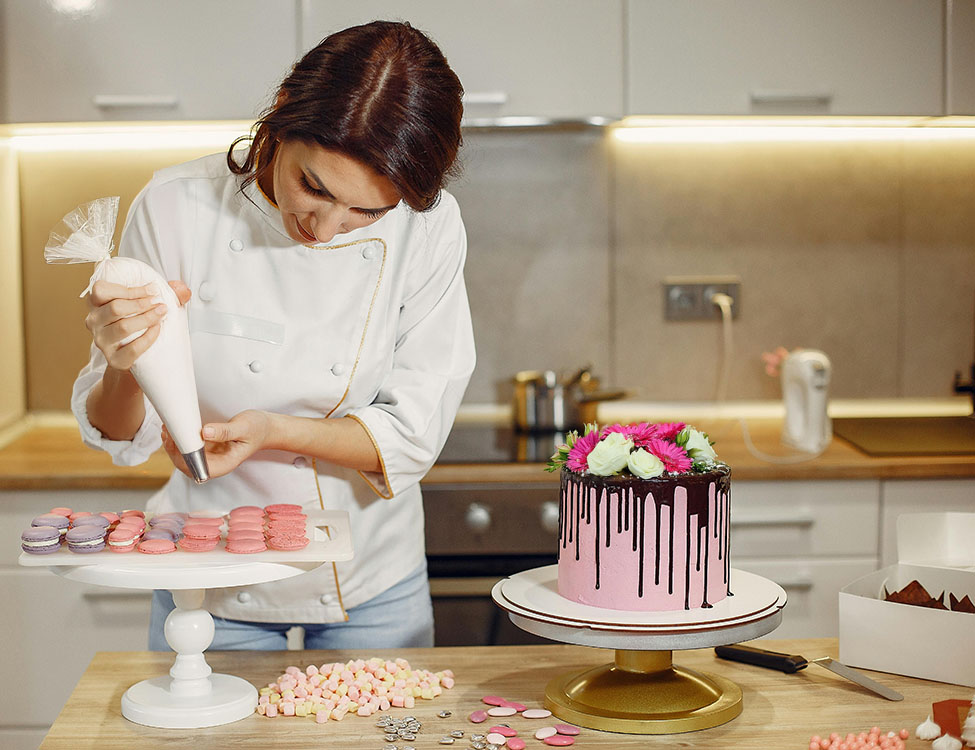 woman decorating macarons